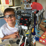 Child building an EV3 robot in activity